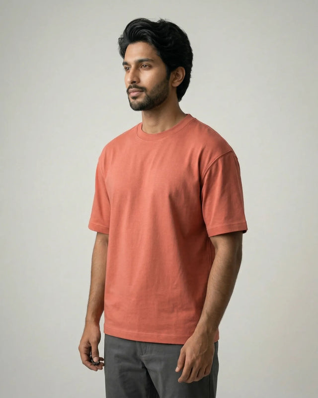 man wearing coral tshirt