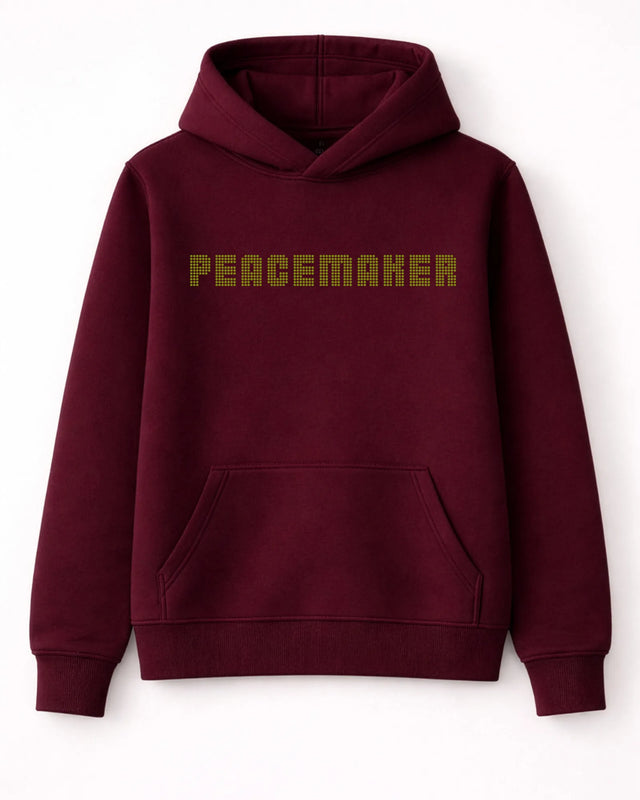 Maroon hoodie with 'PEACEMAKER' text on a white background