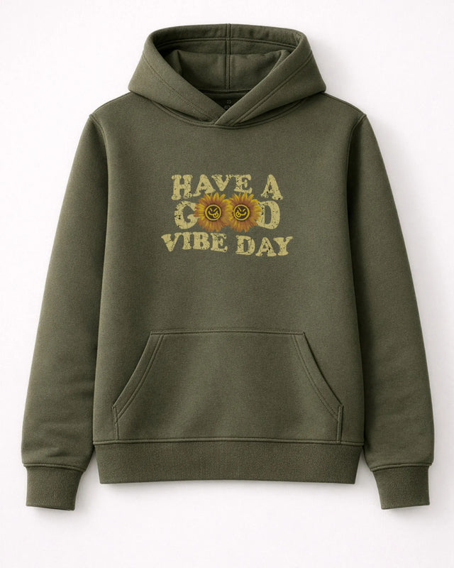 Green hoodie with 'Have a Good Vibe Day' text and sunflower design on a white background