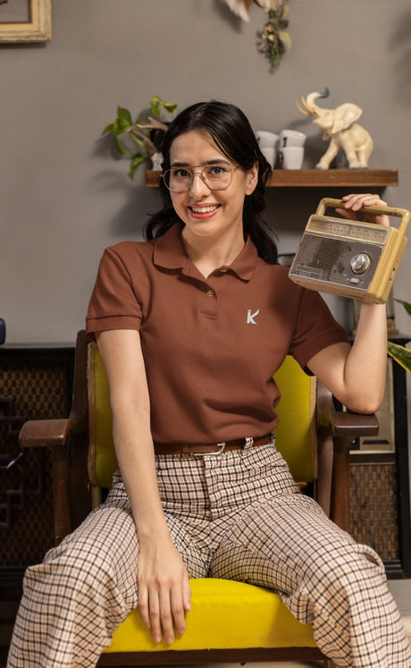 Woman wearing Brick Red color solid polo tshirt