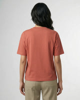 woman wearing coral tshirt