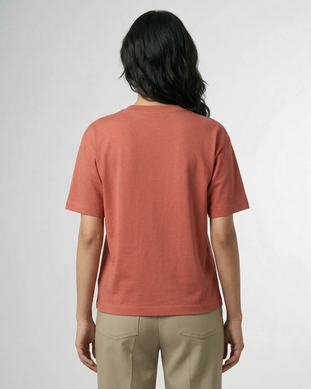 woman wearing coral tshirt