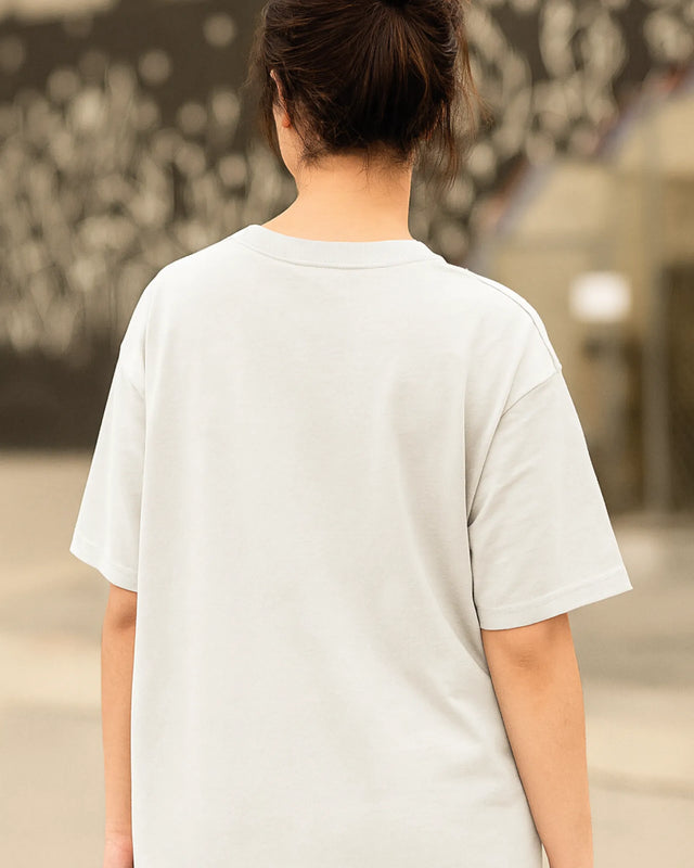 Woman wearing a white t-shirt with a with back view
