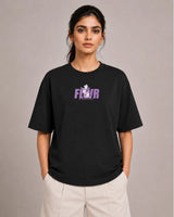 Person wearing a black t-shirt with a purple logo on a plain background