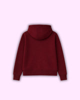 Maroon hoodie on a light purple background
