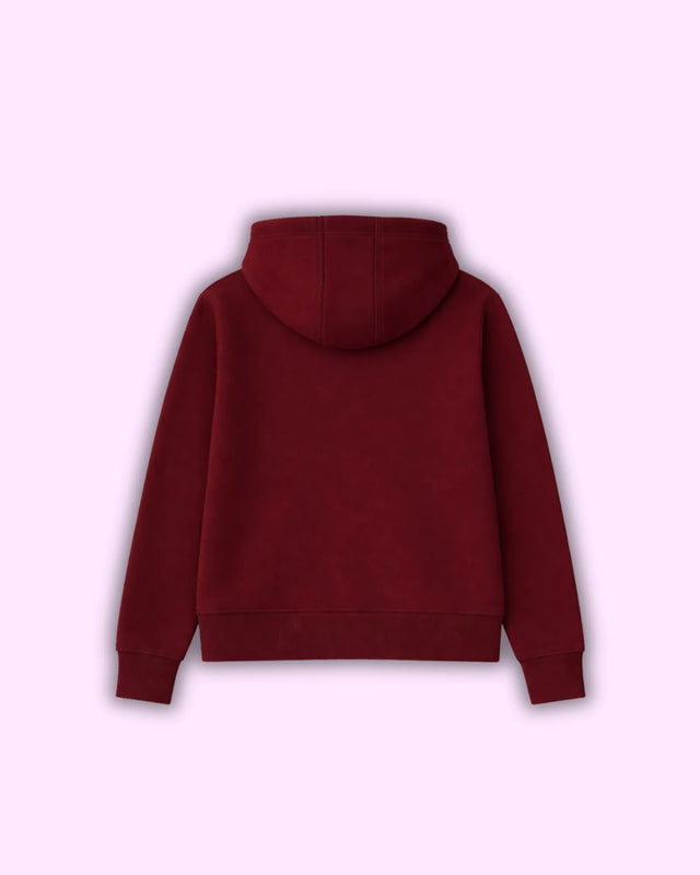 Maroon hoodie on a light purple background