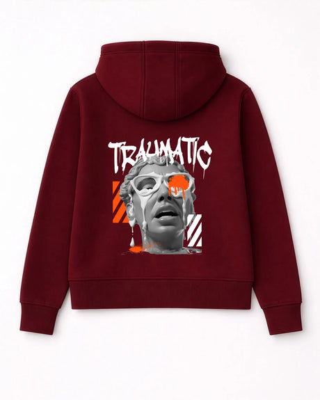 Maroon hoodie with graphic design on the back featuring a face and the word 'TRAUMATIC'.