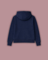 Navy blue hoodie on a pink background